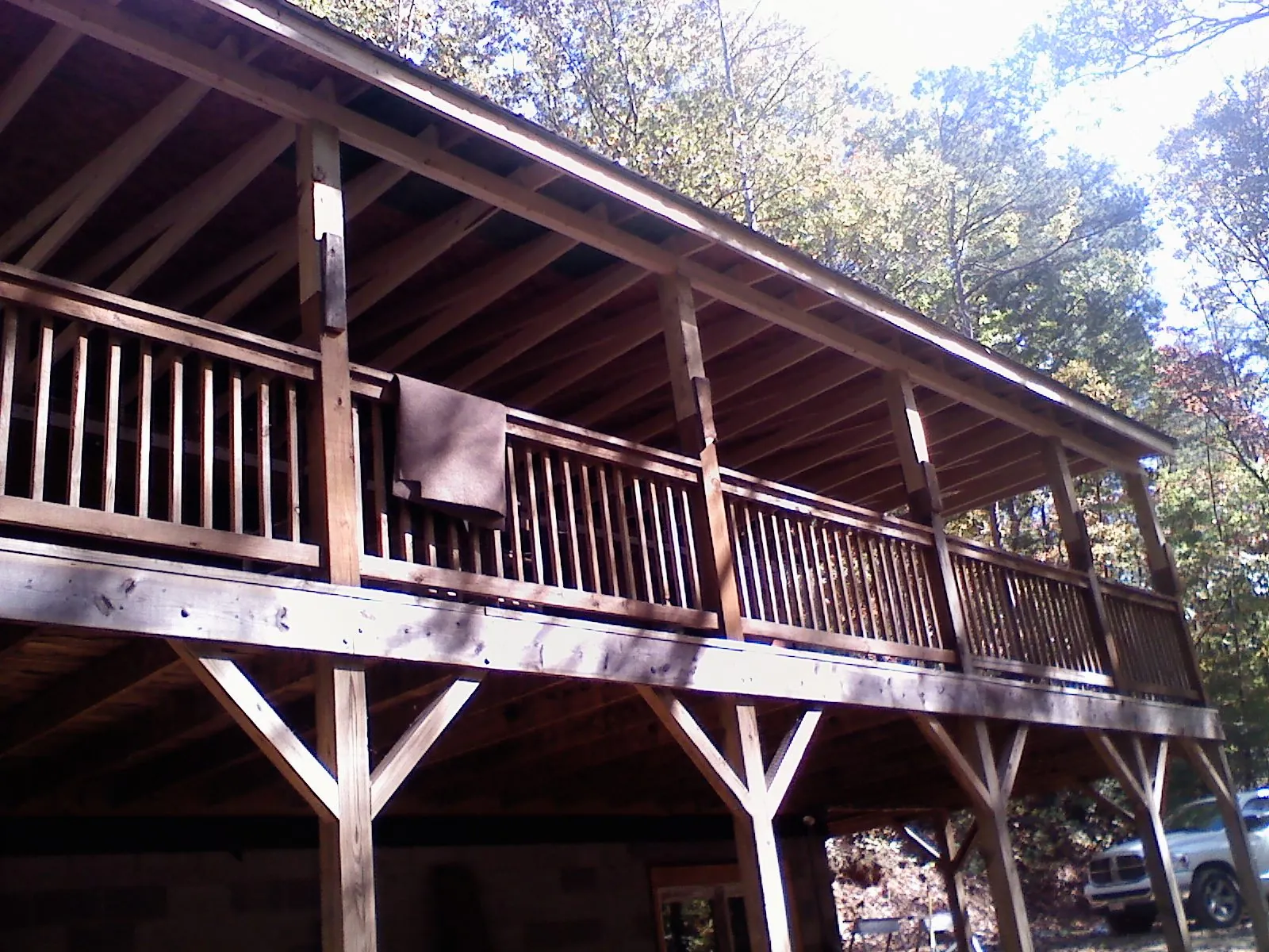 Timber framing under a new elevated porch and deck — Roof Leak Repair in Lamont by Roofing Brothers
